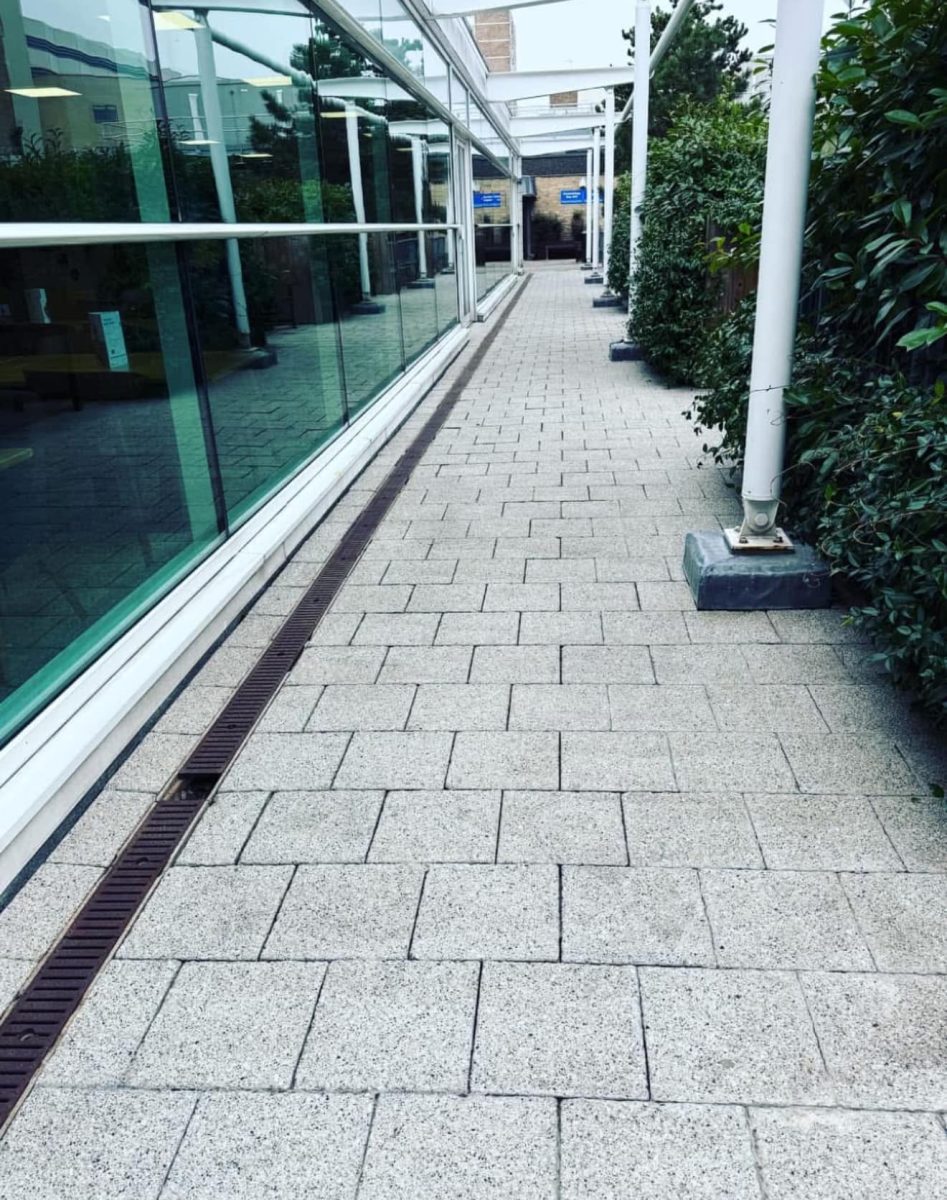 Well-maintained paved area outside a property